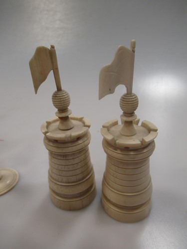 Lot 205 - A 19th century bone chess set, natural and red...