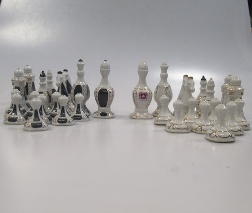 Lot 203 - A 20th French Limoges porcelain chess set, the...