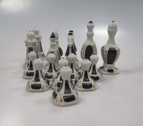 Lot 203 - A 20th French Limoges porcelain chess set, the...