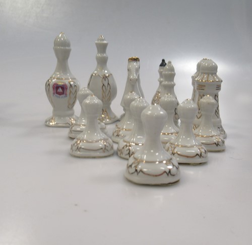 Lot 203 - A 20th French Limoges porcelain chess set, the...