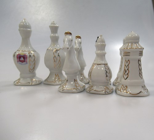 Lot 203 - A 20th French Limoges porcelain chess set, the...