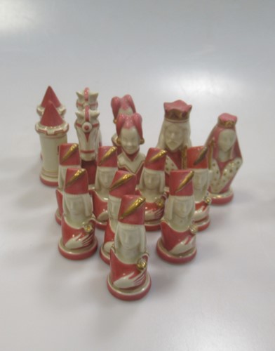 Lot 203 - A 20th French Limoges porcelain chess set, the...