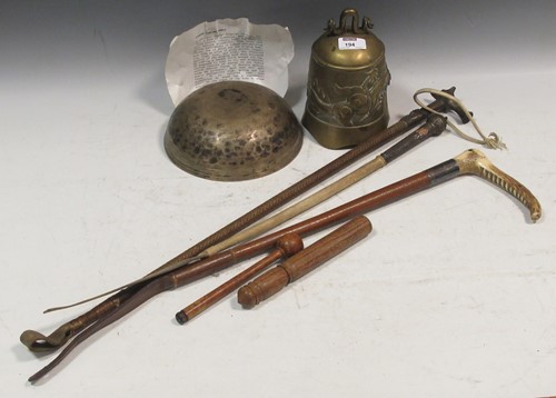Lot 194 - Two silver topped riding crops together with a...