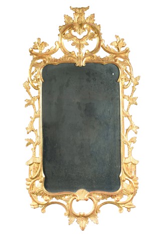 Lot 250 - A George III carved giltwood mirror