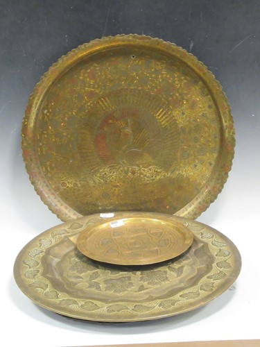 Lot 94 - A collection of Indian brass circular trays