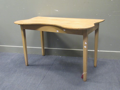 Lot 436 - A 19th century pine side table with kidney...