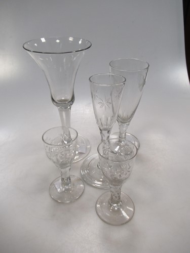Lot 272 - A George III faceted stem wine glass, two...