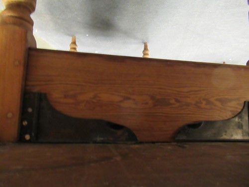 Lot 572 - A pine drop leaf table with two drawers on...