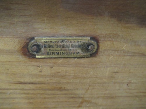 Lot 572 - A pine drop leaf table with two drawers on...