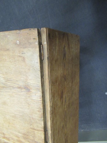 Lot 572 - A pine drop leaf table with two drawers on...