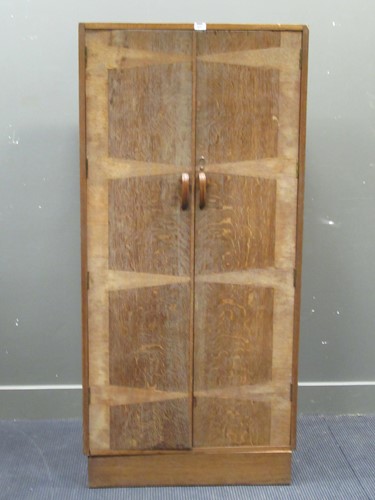 Lot 643 - A 20th century oak two door wardrobe 163 x 77...