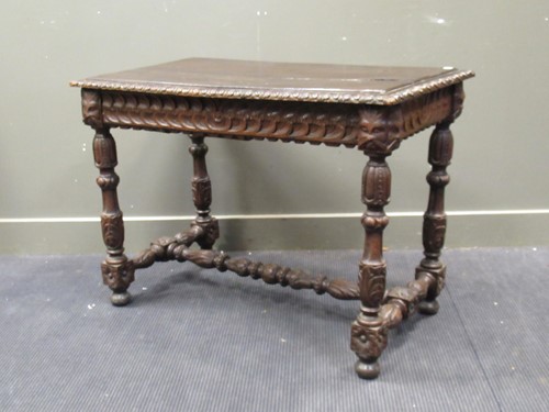 Lot 702 - A Victorian carved oak table 77 x 105 x 61cm