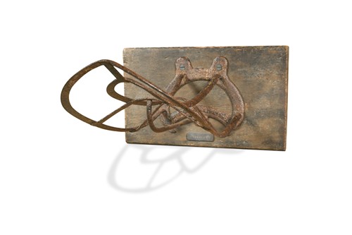 Lot 906 - A cast iron saddle rack by Cottam and Co., 19th century