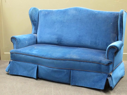 Lot 759 - A blue upholstered three seater sofa together...