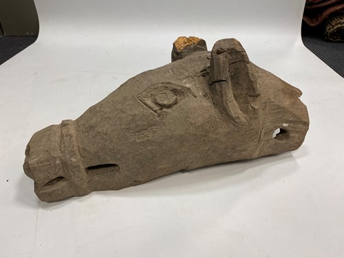 Lot 361 - A Magar carved wood horse head, North Western Nepal, probably 19th/early 20th century
