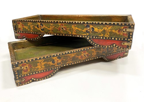 Lot 381 - A pair of Tibetan painted wood tea trays, late 19th century