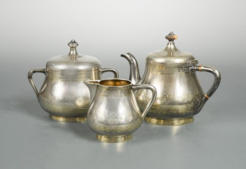 Lot 467 - A 19th century Russian metalwares parcel gilt harlequin three-piece tea set