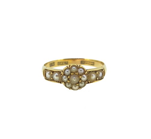 Lot 106 - An early 20th century split pearl cluster style ring