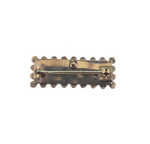 Lot 31 - A 19th century hairwork and pearl memorial brooch