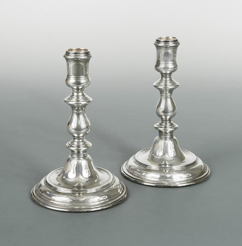 Lot 580 - A pair of mid 20th century silver candlesticks, mark of Asprey & Co.
