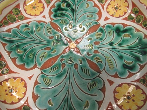 Lot 1 - A Della Robia dish, a Poole bowl and a...