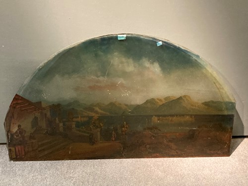Lot 573 - A glass overdoor panel painted with a...