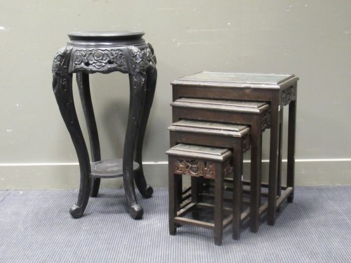Lot 520 - A Chinese carved wood nest of 4 tables...
