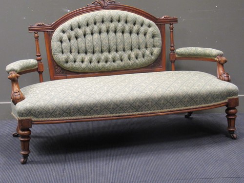 Lot 521 - A Victorian walnut framed salon settee, 157 cm...