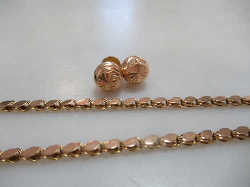 Lot 190 - A chain with a hook clasp stamped '14', weight...
