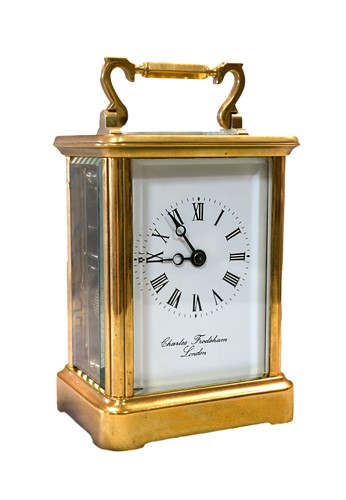 Lot 516 - A modern brass carriage clock by Charles Frodsham, London
