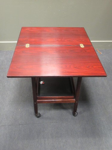 Lot 461 - A Scandinavian style trolley with foldover...