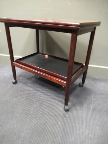 Lot 461 - A Scandinavian style trolley with foldover...