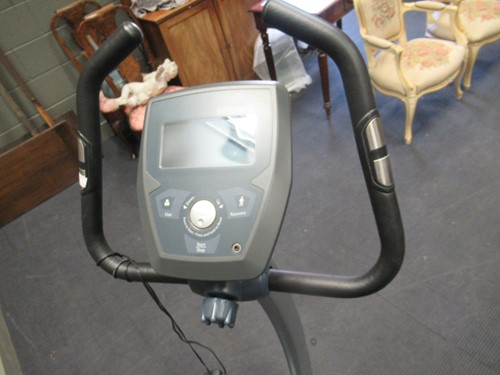Lot 534 - A John Lewis exercise bike with display