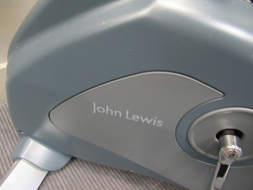 Lot 534 - A John Lewis exercise bike with display