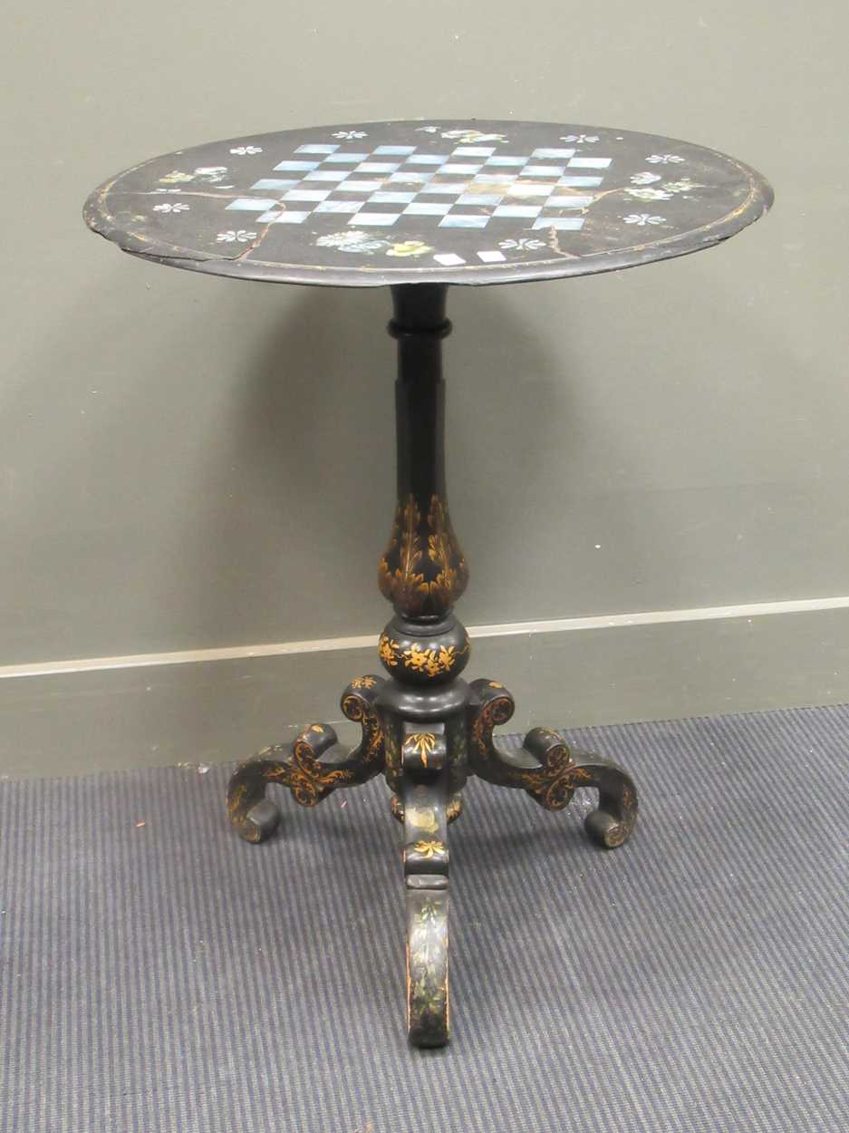 Lot 409 - Black laquer chess top table with mother of...