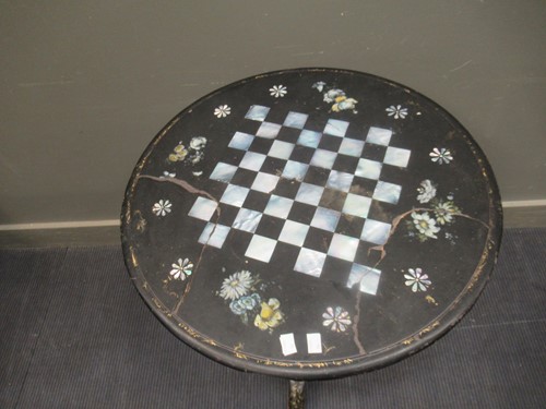 Lot 409 - Black laquer chess top table with mother of...