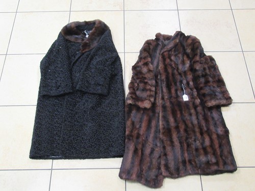 Lot 154 - An astrakan three-quarter length coat with fur...