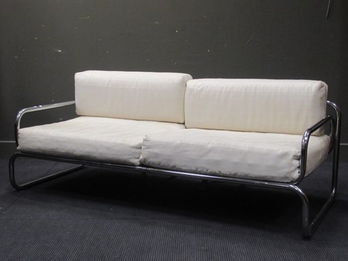 Lot 581 - Chrome tubular sofa with white striped...