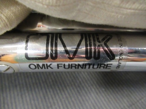 Lot 632 - Chrome tubular sofa with white striped...