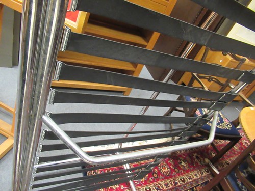 Lot 632 - Chrome tubular sofa with white striped...
