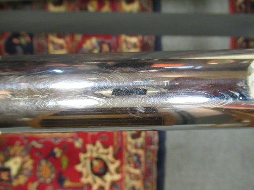 Lot 632 - Chrome tubular sofa with white striped...
