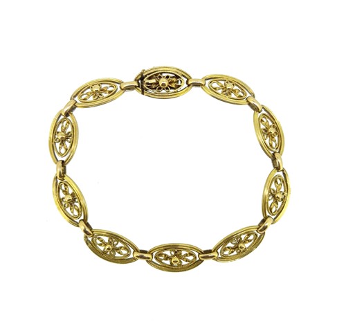 Lot 66 - A French metalwares 18ct gold fancy floral link bracelet