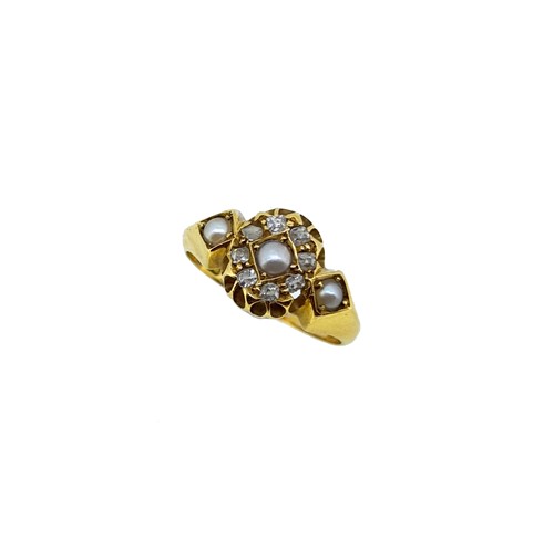 Lot 107 - An Edwardian split pearl and diamond cluster style ring