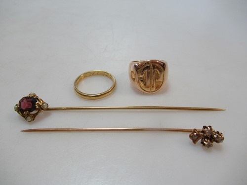 Lot 181 - A signet ring tested as 18ct gold, a wedding...