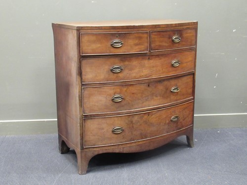 Lot 446 - A Regency mahogany bowfront chest on drawers