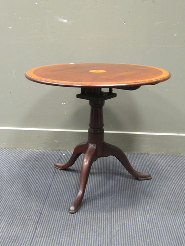 Lot 428 - A 19th Century mahogany tilt top wine table,...