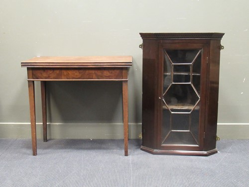 Lot 411 - A 19th century mahogany fold over tea table 73...