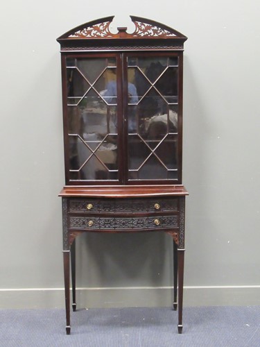 Lot 400 - An Edwardian mahogany display cabinet on stand...