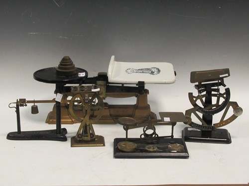 Lot 146 - A set of Victorian brass and cast iron shop...