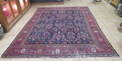 Lot 599 - Tabriz style carpet, stylised floral motifs on...